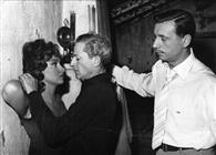 Gina Lollobrigida, Jules Dassin and Yves Montand during the shooting of the film