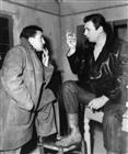 <div><span style="font-size: 10pt;">Giuseppe De Santis and Yves Montand during the shooting of the film</span></div>
<div><span style="font-size: 10pt;">Photo by Giovan Battista Poletto</span></div>